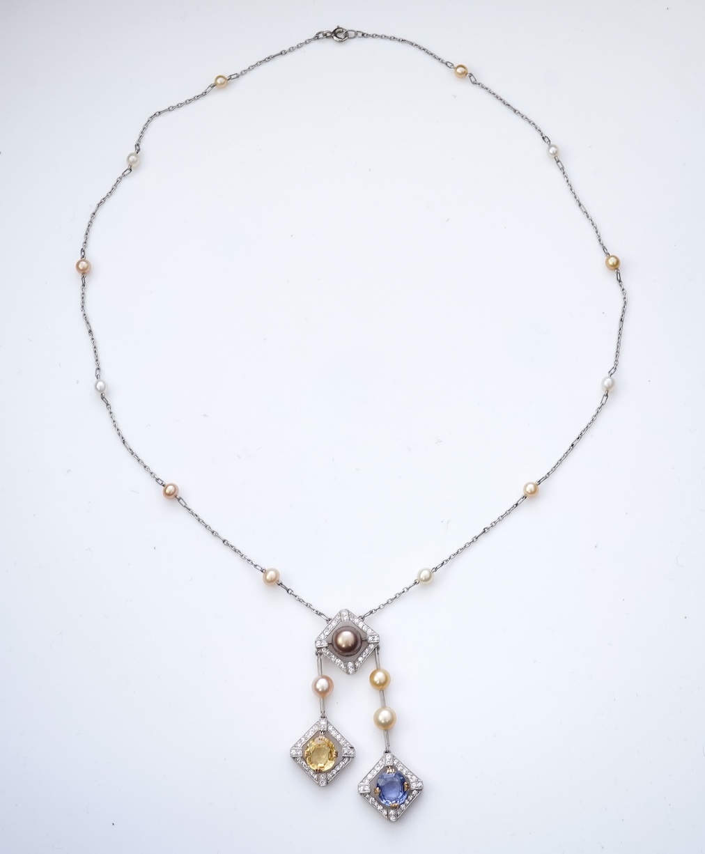 An Art Deco sapphire, natural pearl and diamond necklace, circa 1920